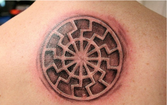 Aztec sun tribal tattoo on upper back 18