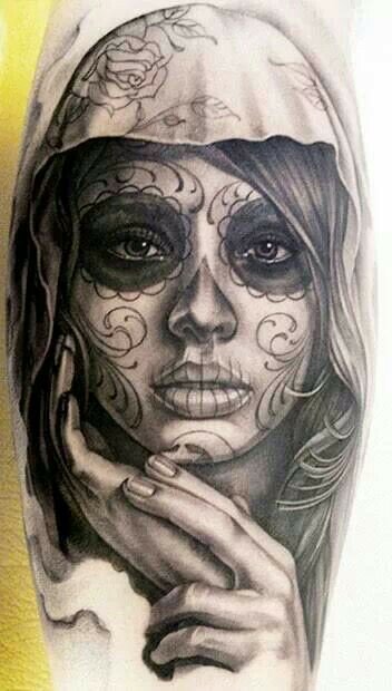 Hand holding Day of the dead tattoo 27