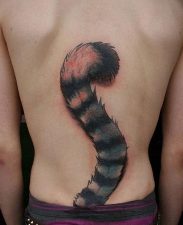 Amazimg Tattoo with clever idea in lower back 13