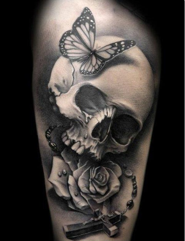 Butterfly and skull tattoo