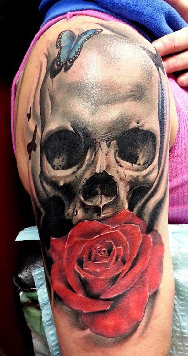 Skull and roses sleeve tattoo