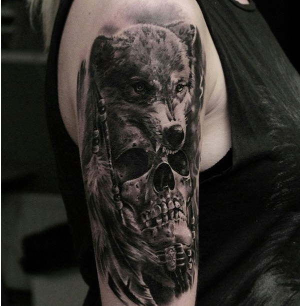 Skull and wolf tattoo