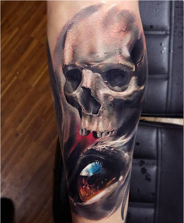Skull with eye tattoo