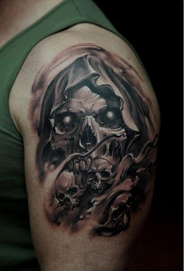 Skulls tattoo on hlaf sleeve